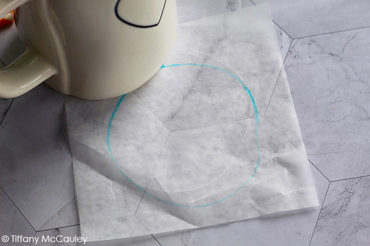 A ring drawn on wax paper after the coffee mug was outlined around the bottom to create a template.