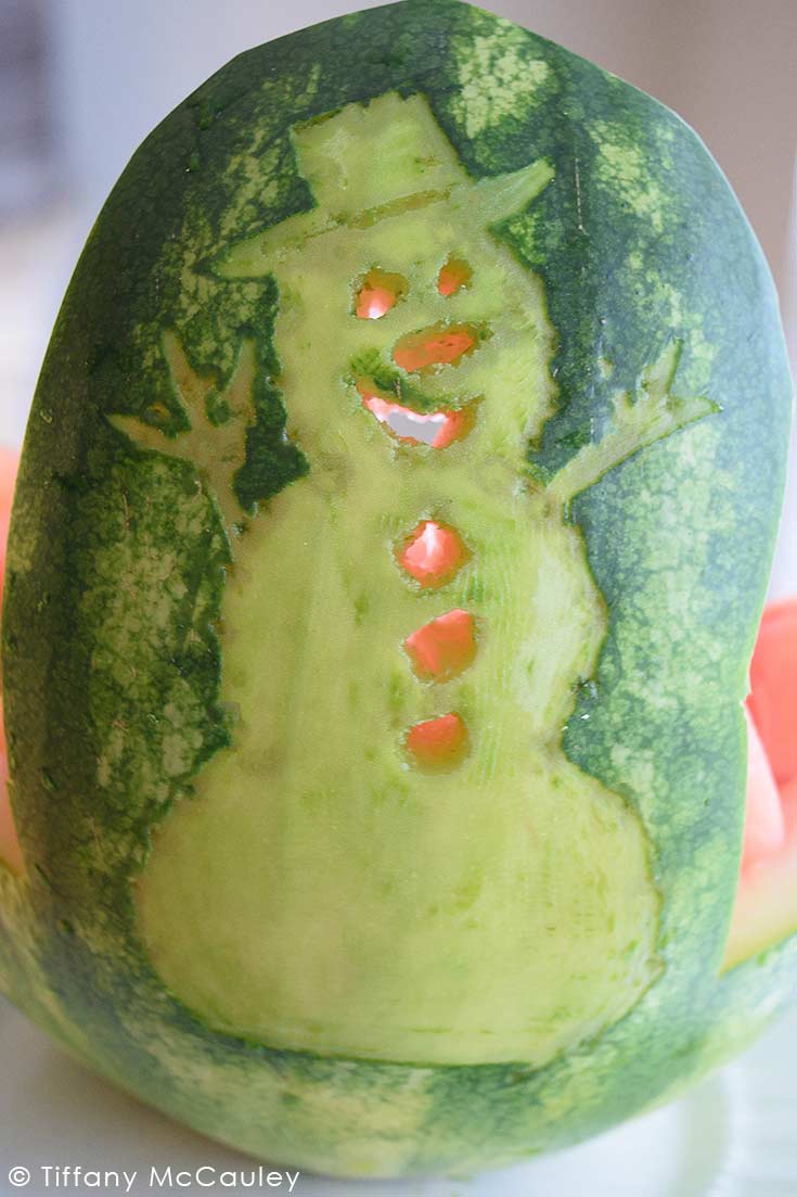 A front view of the snowman in this Watermelon Snowman Bowl