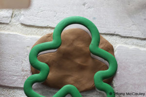 Step three is to cut out the gingerbread man.