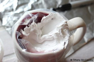 Step five is to put your spackle into a cake decorating bag with a tip.