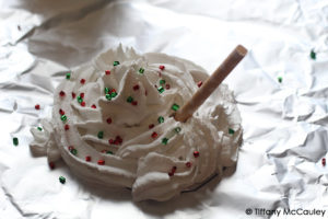 Step eight is to insert the straw into the topper.