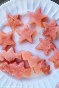 Step eight is to use Christmas cookie cutters to cut all remaining watermelon into holiday shapes.
