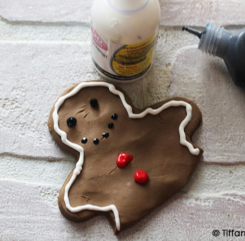 Step nine is to decorate your gingerbread man and insert into the mug topper.