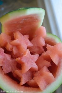 Step nine is to fill your watermelon bowl with your cut out watermelon pieces to serve.