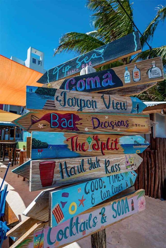 Cay Caulker, Belize - Colorful wooden street sign