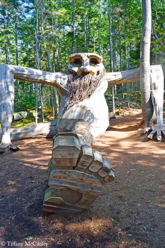 A front view of the Birk statue in the Coastal Maine Botanical Gardens.