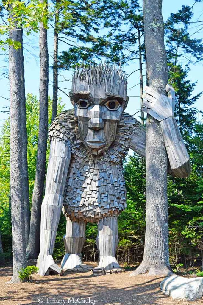 A front view of the Roskva statue inside the Coastal Maine Botanical Gardens.