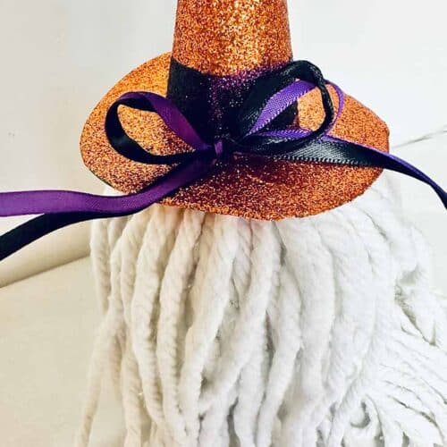 Ribbon bow added to the witch hat.